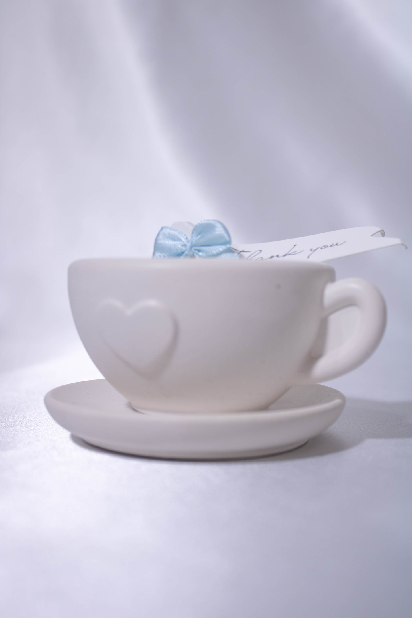 Vela taza