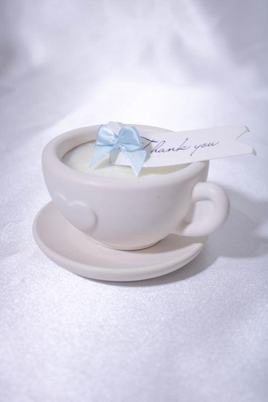 Vela taza